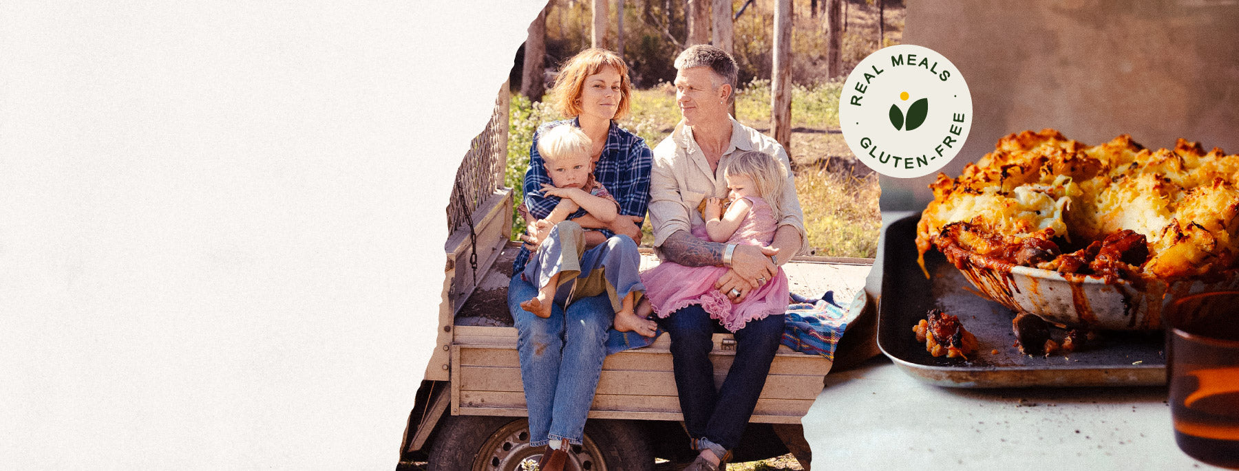 Family sitting on a truck bed with a meal kit logo in the corner